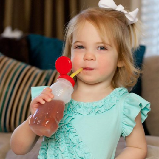Child using ARK Bear Bottle – NDIS-funded therapy bottle designed for teaching safe straw drinking and improving suction