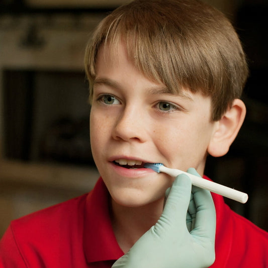 child / teenager using ARK Oral Motor Probe.