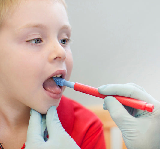 Red and blue ark z vibe being used with a child. May be NDIS funded.