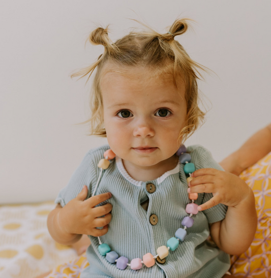 Child wearing Princess and the Pea sensory necklace – chewable and safe silicone jewellery for self-regulation and oral sensory needs, 
