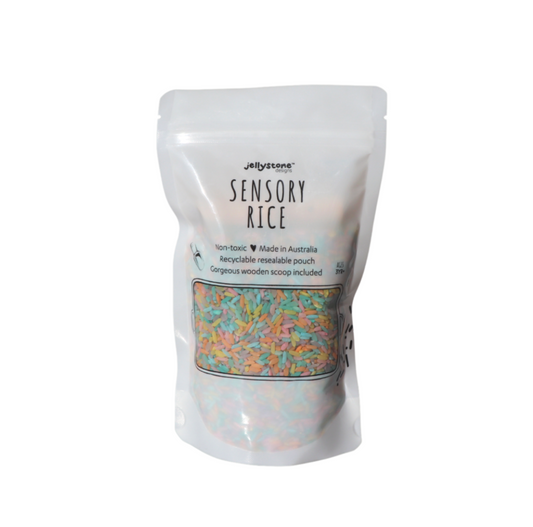 Resealable pouch of handmade rainbow sensory rice with label, ideal for fine motor skills, sensory play, and potentially NDIS-funded activities